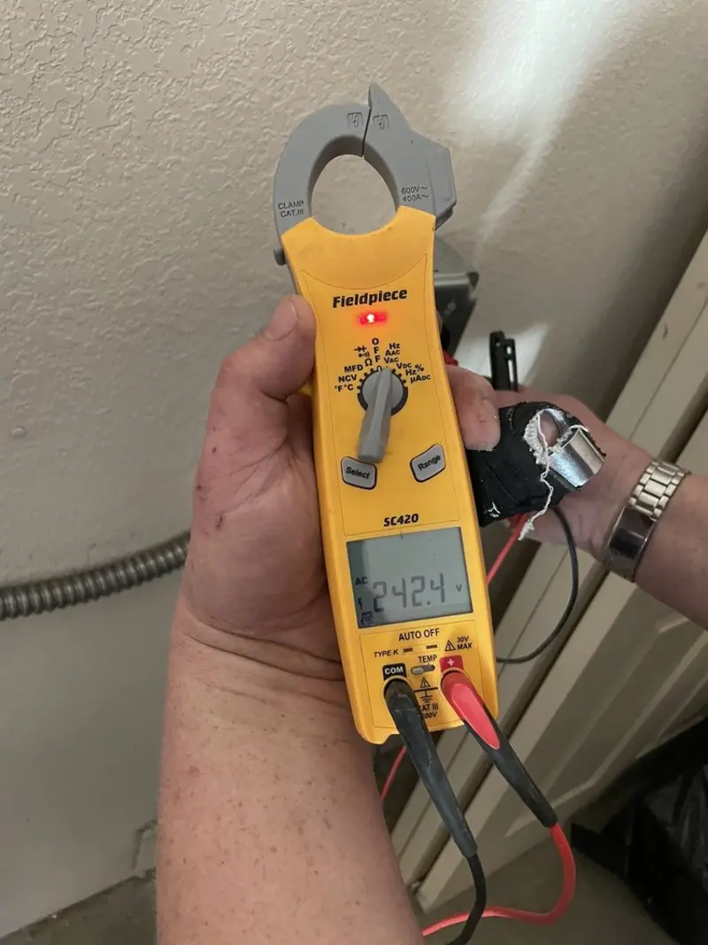 Voltage testing with clamp meter during Ceiling Fan Installation in Bloomingdale